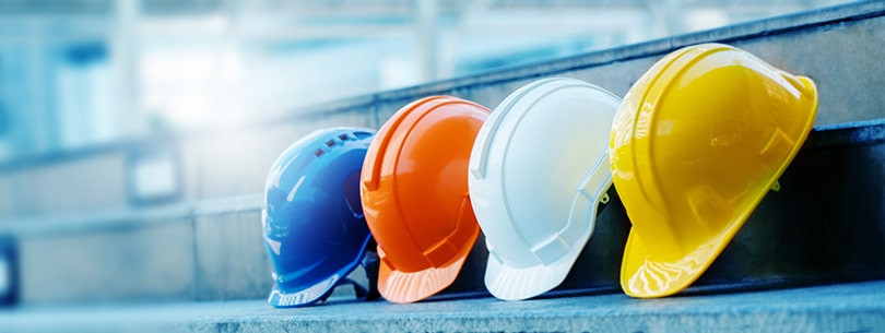 Multicolored Safety Construction Worker Hats. Teamwork of the construction team must have quality. Whether it is engineering, construction workers. Have a helmet to wear at work. For safety at work.